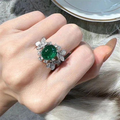 Luxurious Oval Zirconia and Green Gemstone Ring