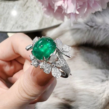 Luxurious Oval Zirconia and Green Gemstone Ring