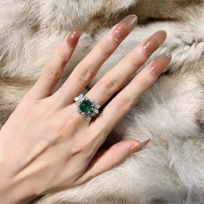 Luxurious Oval Zirconia and Green Gemstone Ring