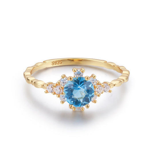 Clarity Blue Topaz Ring (Yellow Gold)